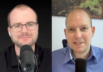 Split-screen video call: two men speaking into microphones on each side.